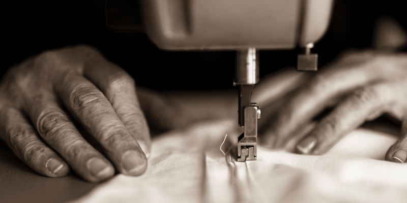 Close-up of precision sewing work, highlighting technical expertise and attention to detail